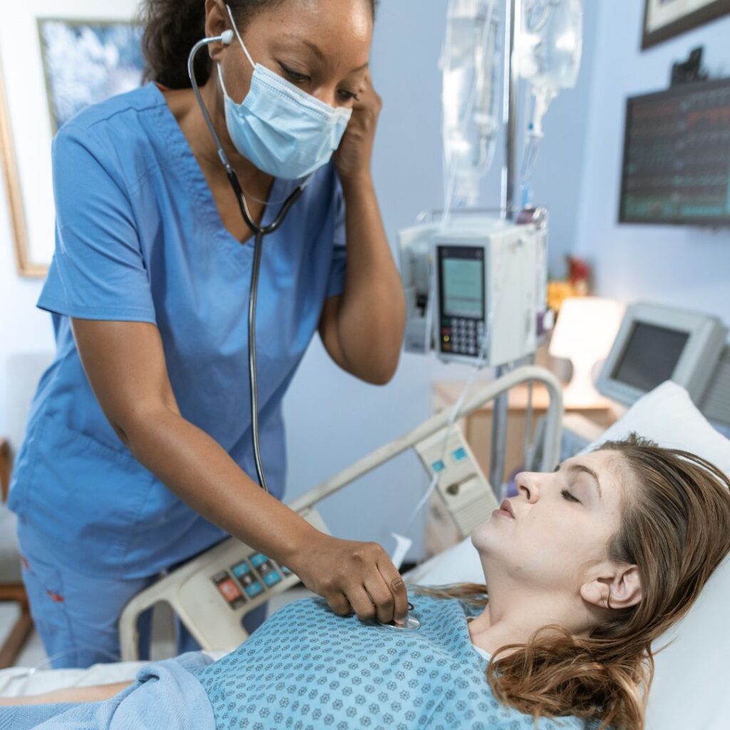 nurse helping sick patient