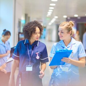 nurses looking at paperwork