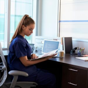 nurse working on laptop