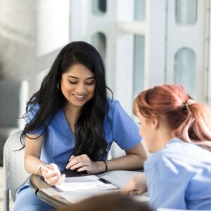 two nurses studying