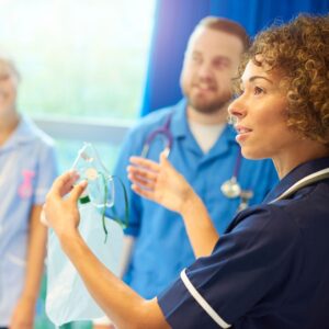 nurse explaining oxygen mask