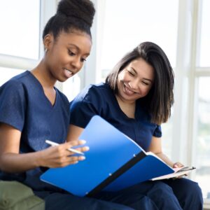 two nurses studying