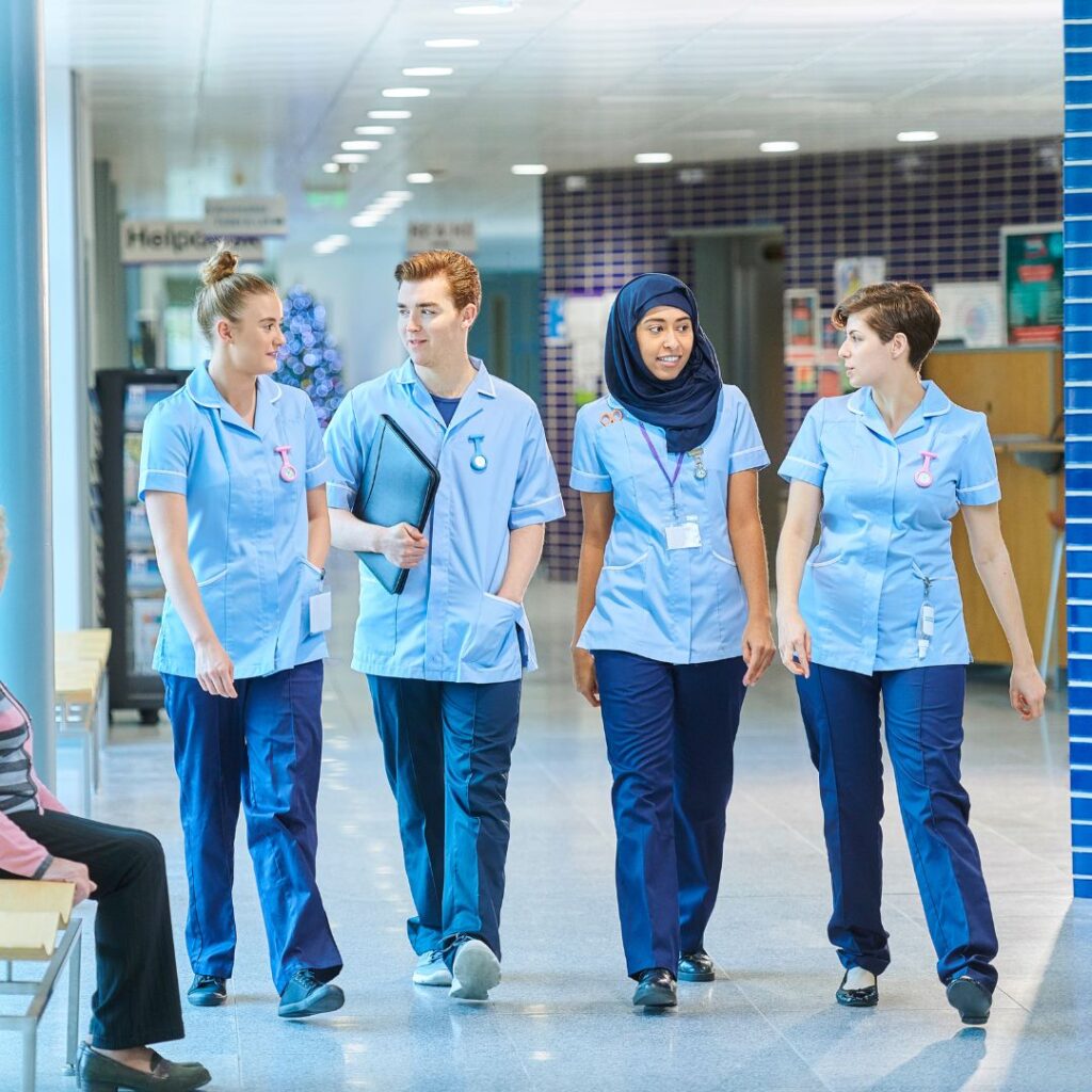 Nurse walking together in hospital