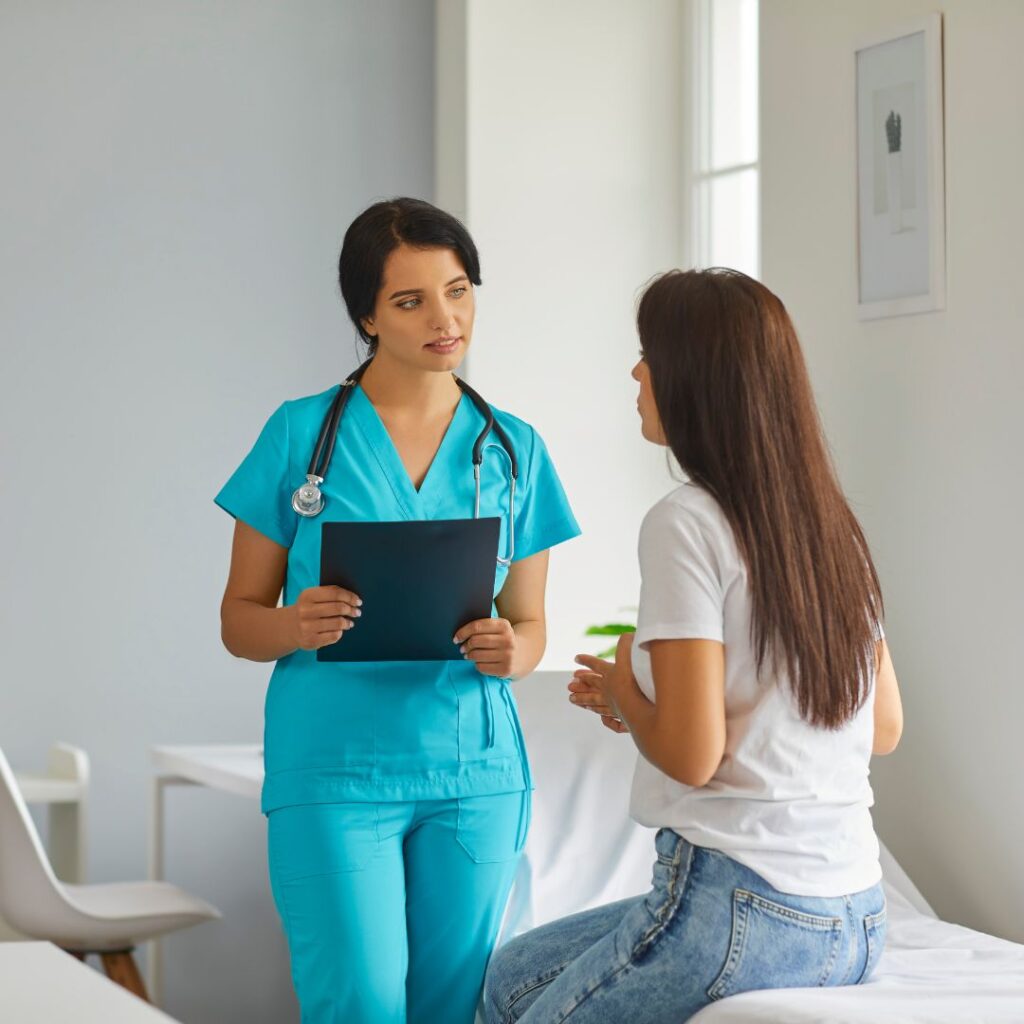 nurse talking with a patient