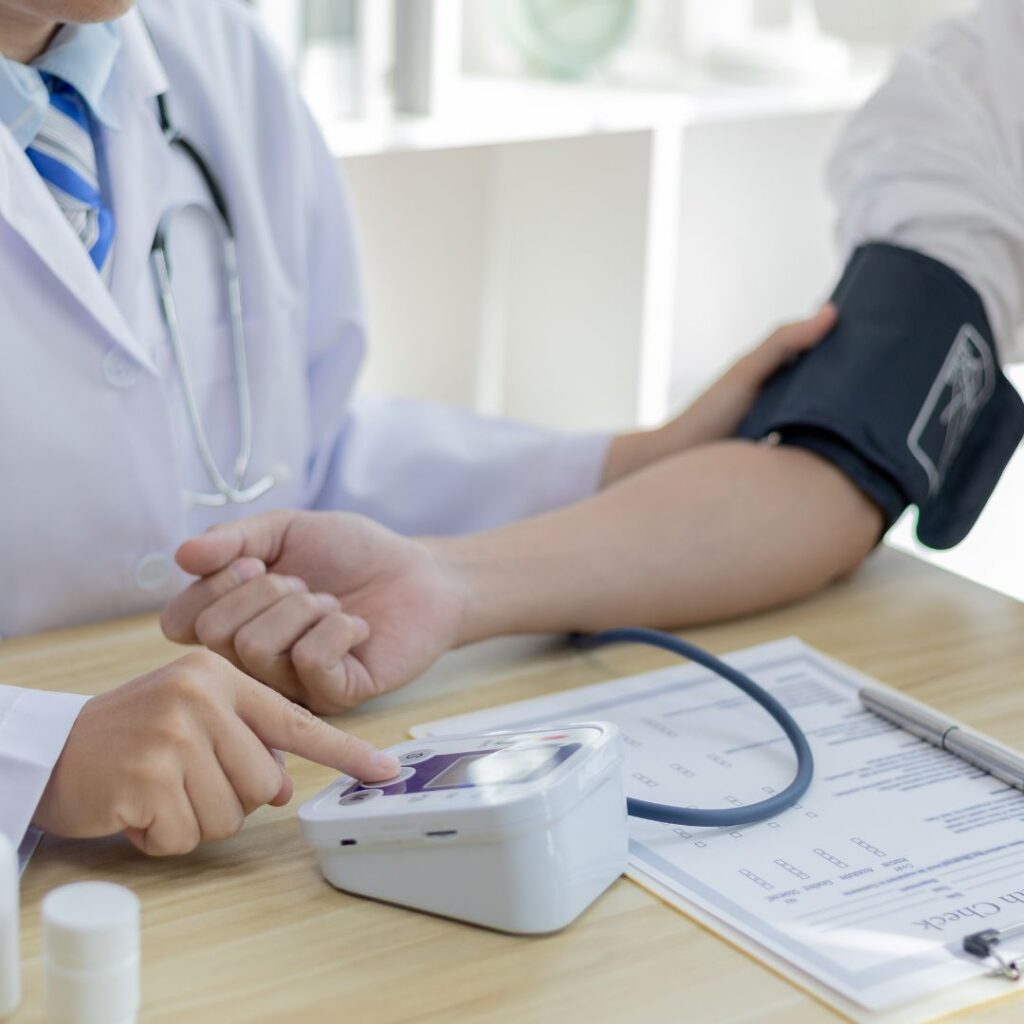 nurse taking blood pressure