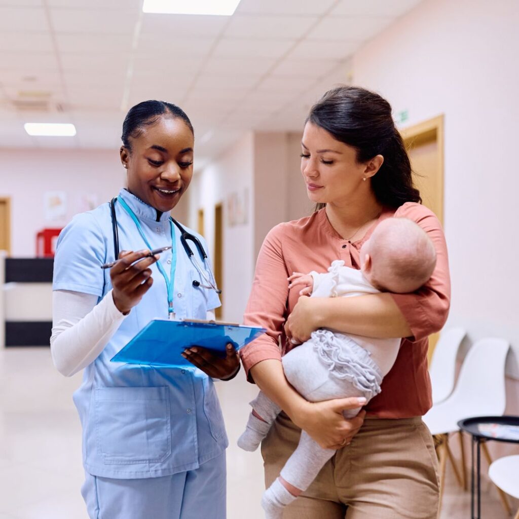 Nurse speaking to a new mother