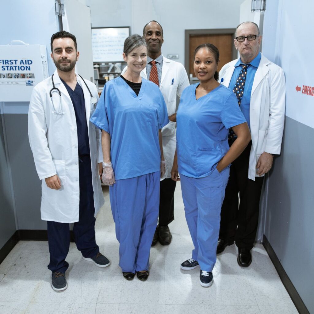 A group of nursing staff and doctors